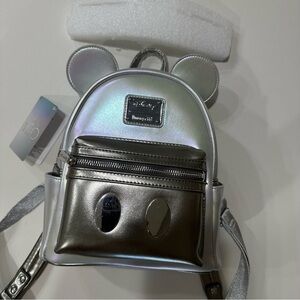 Like new Disney 100 Platinum Mickey Mouse Loungefly Backpack silver